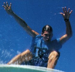 Surfer in wet blue T-shirt